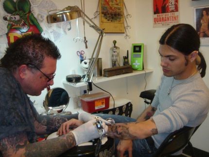 Nick getting his tattoo