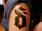 Kenny created a Shinedown tattoo