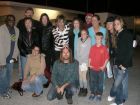 Shinedown band members, cast, crew and some fans pose on set of the filming of 